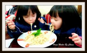 Nana and Chacha enjoying their spaghetti